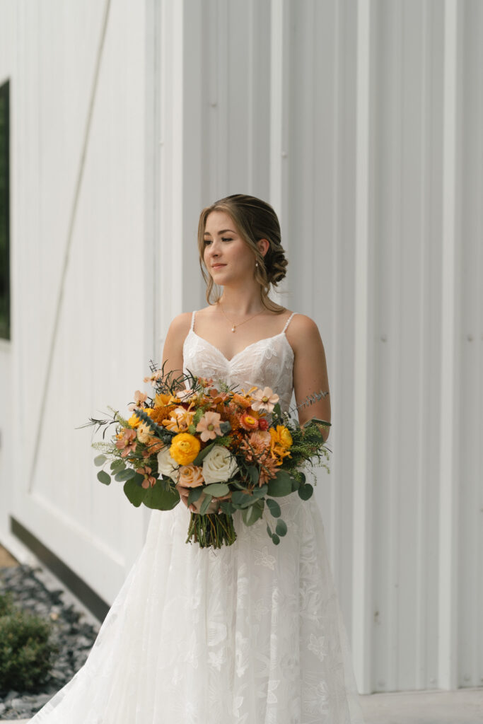 bride with floral bouquet, wedding bouquet, wedding day flowers, orlando wedding flowers, 