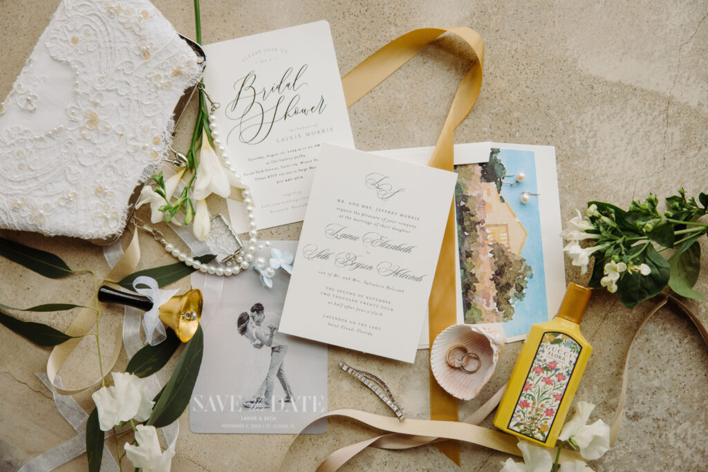 wedding watercolors, details from the wedding, pear purse, wedding bands, wedding rings, invitations for wedding, stationary, luxury barn venue in Florida