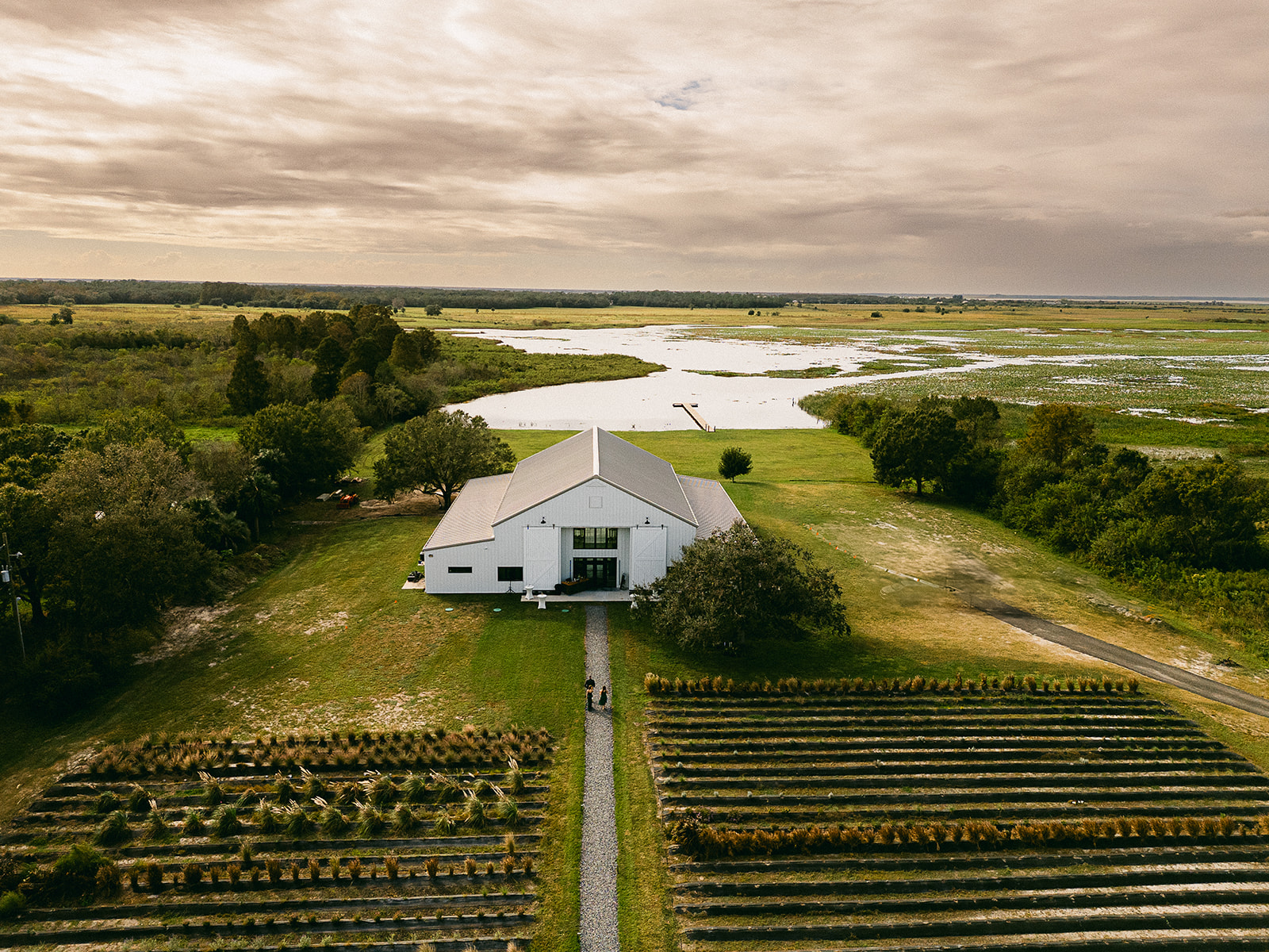 aerial view of luxury barn wedding venue on Lake Tohopekaliga in Saint Cloud