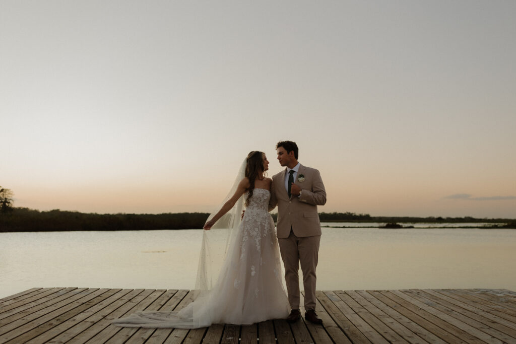 bride and groom at lakeside venue in Saint Cloud, Florida