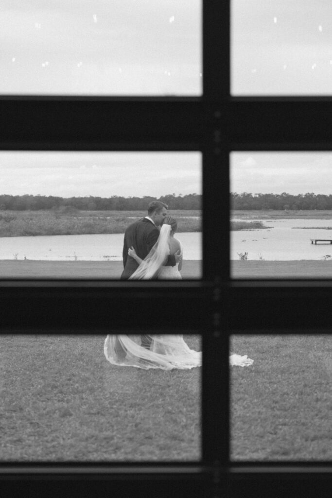 bride and groom sharing a private moment before wedding ceremony in Saint Cloud, Florida