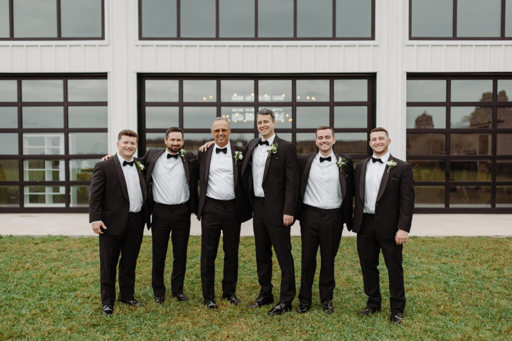 groom with groomsmen at Lavender on the Lake, a wedding venue in Central Florida, luxury barn wedding venue