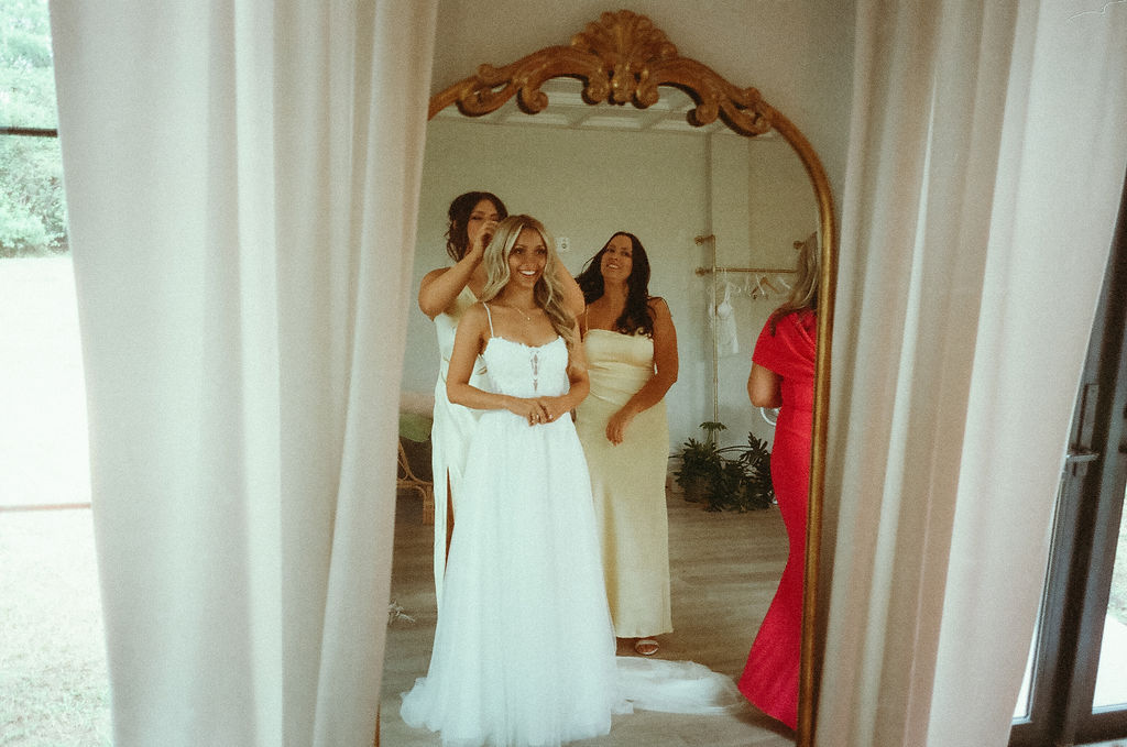 bride in her bridal gown in the bridal suite in Central Florida