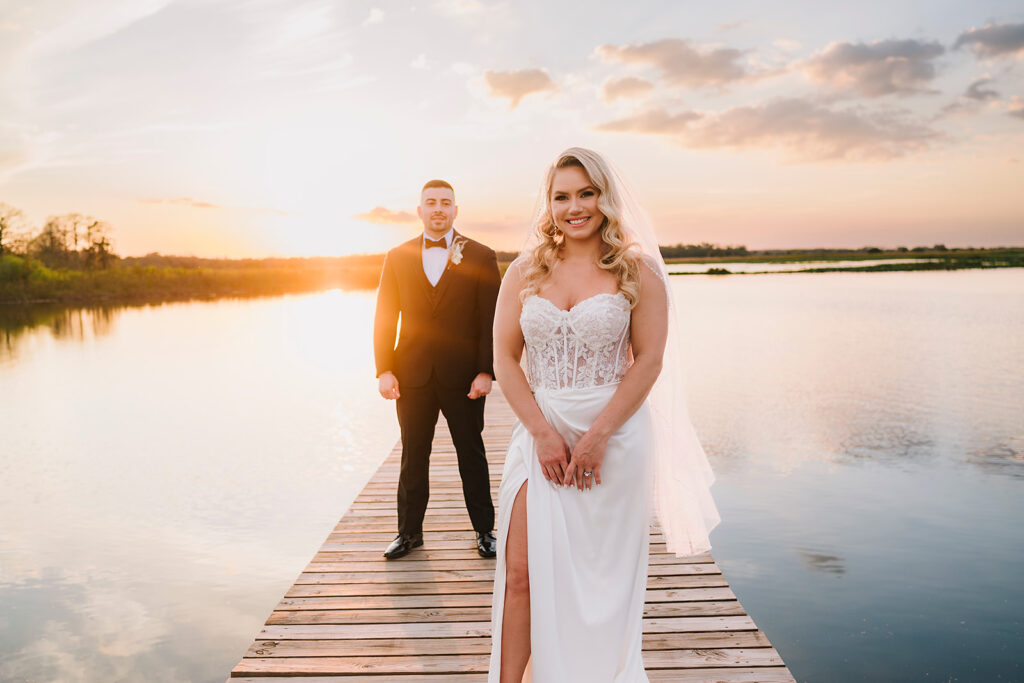 bride and groom creative session after their wedding at Lavender on the Lake, a lakeside wedding venue in Saint Cloud, Florida