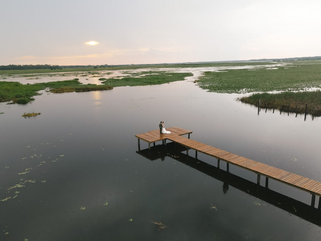 sunset wedding photos for bride and groom at wedding venue near Kissimmee, Florida