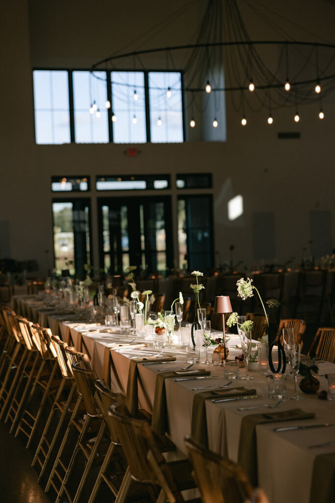 Orlando wedding venue reception table setting, luxury barn wedding venue with beautiful light