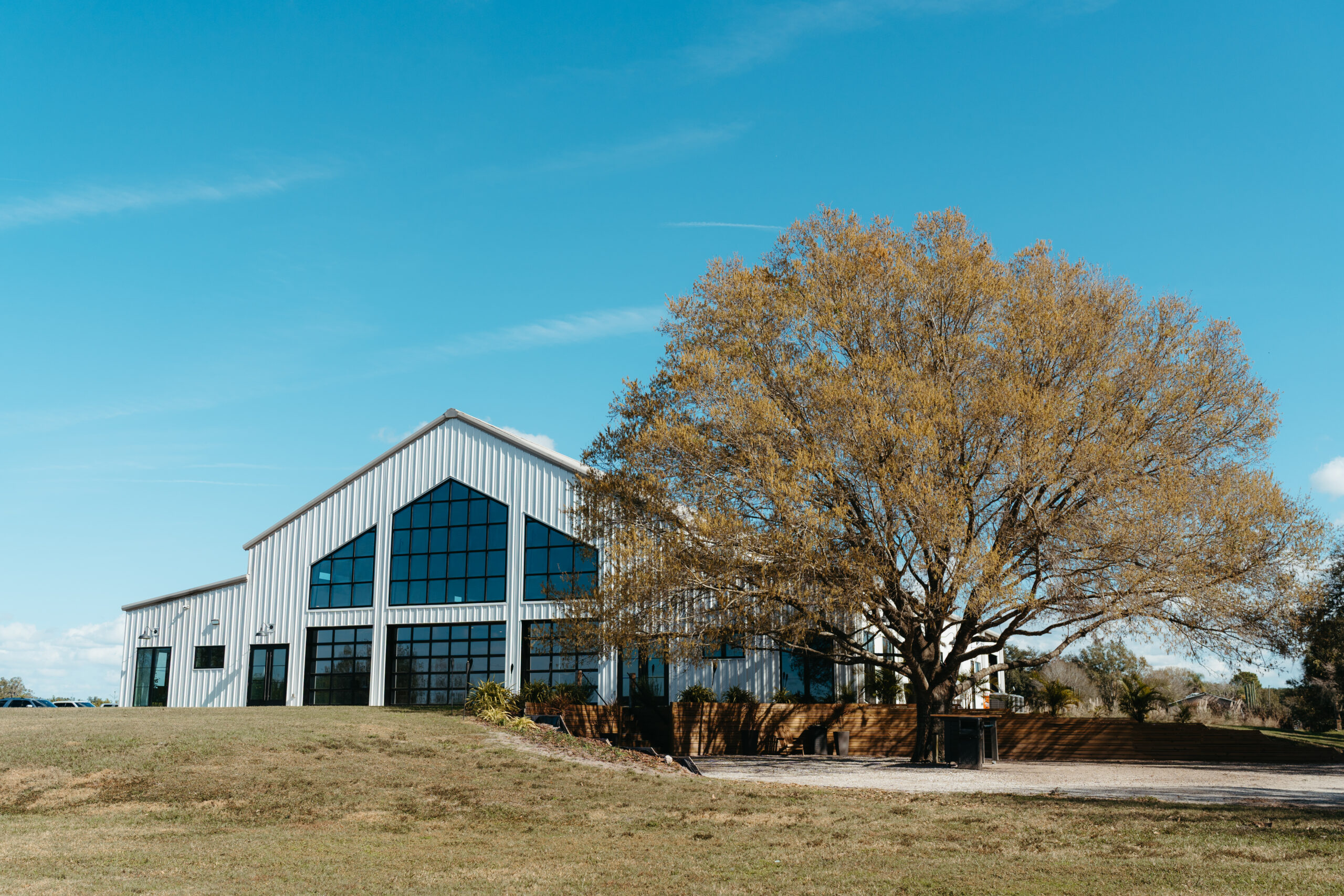 Exterior and back of Lavender on the Lake, a wedding venue in Saint Cloud, Florida
