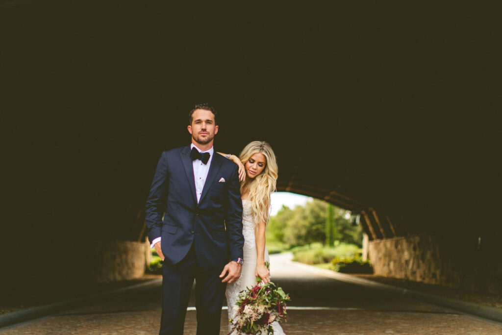 bride and groom under a bride at central florida wedding venue