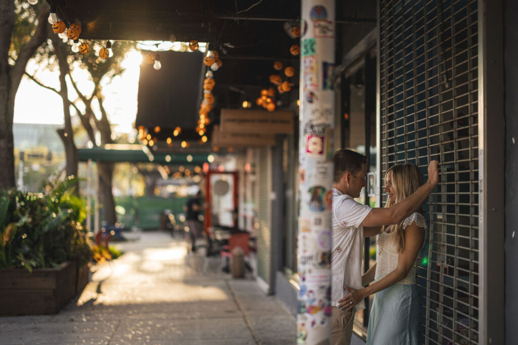 couple on a date night in florida, engagement ring on hand, fun things to do, 