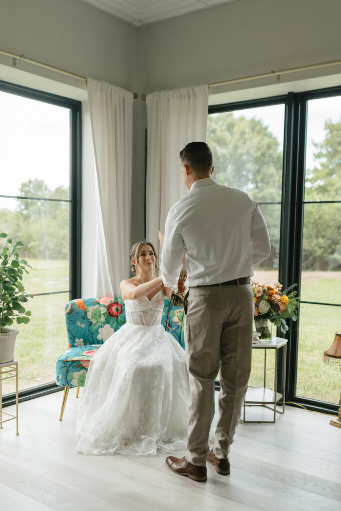 bride’s brother seeing her for the first time at Florida wedding venue